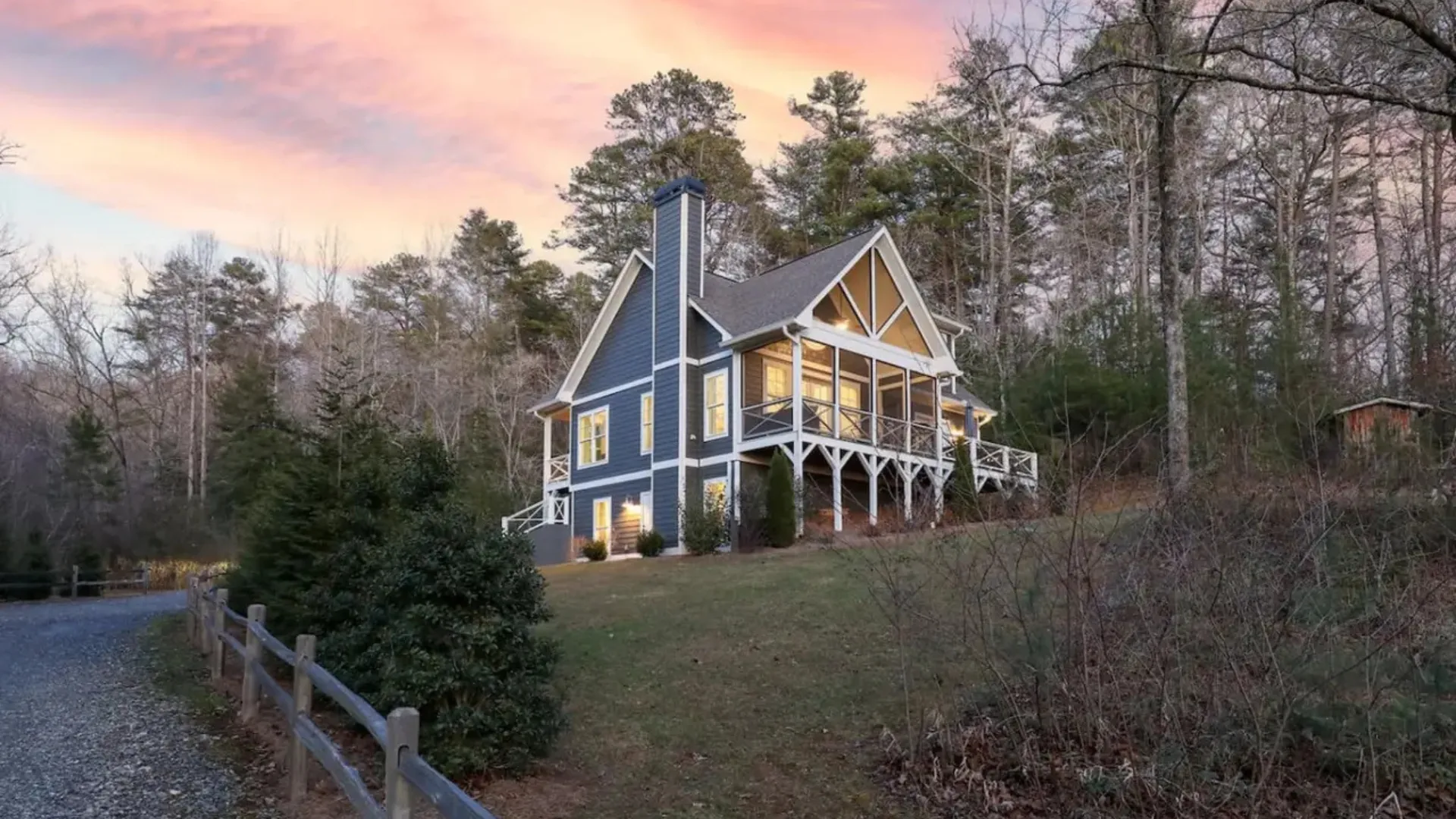 Lake Burton vacation rental with screened porch, fire pit, and lake access