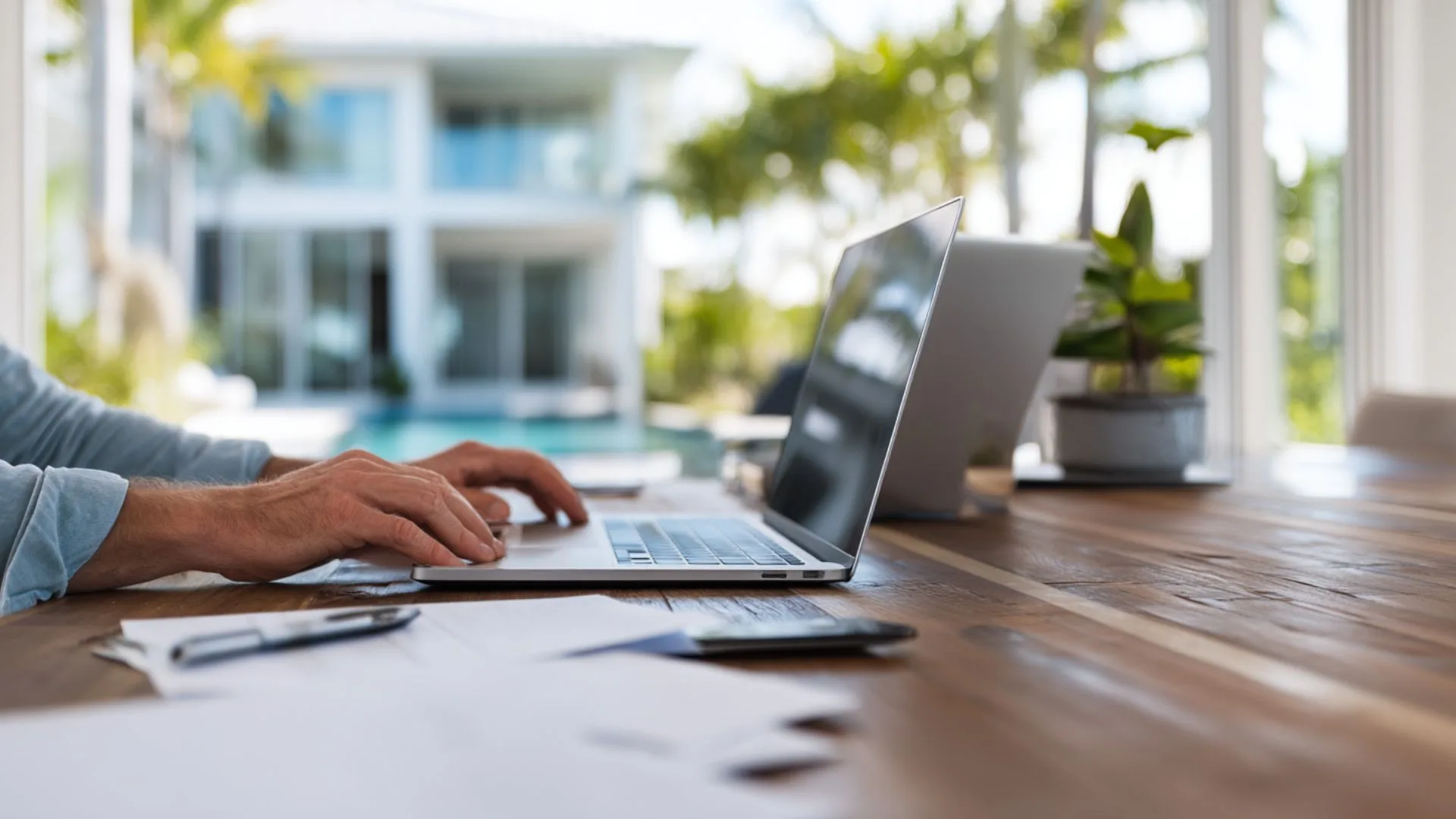 Landlord reviewing costs and benefits of hiring expert property management in Florida for a 2025 vacation rental property