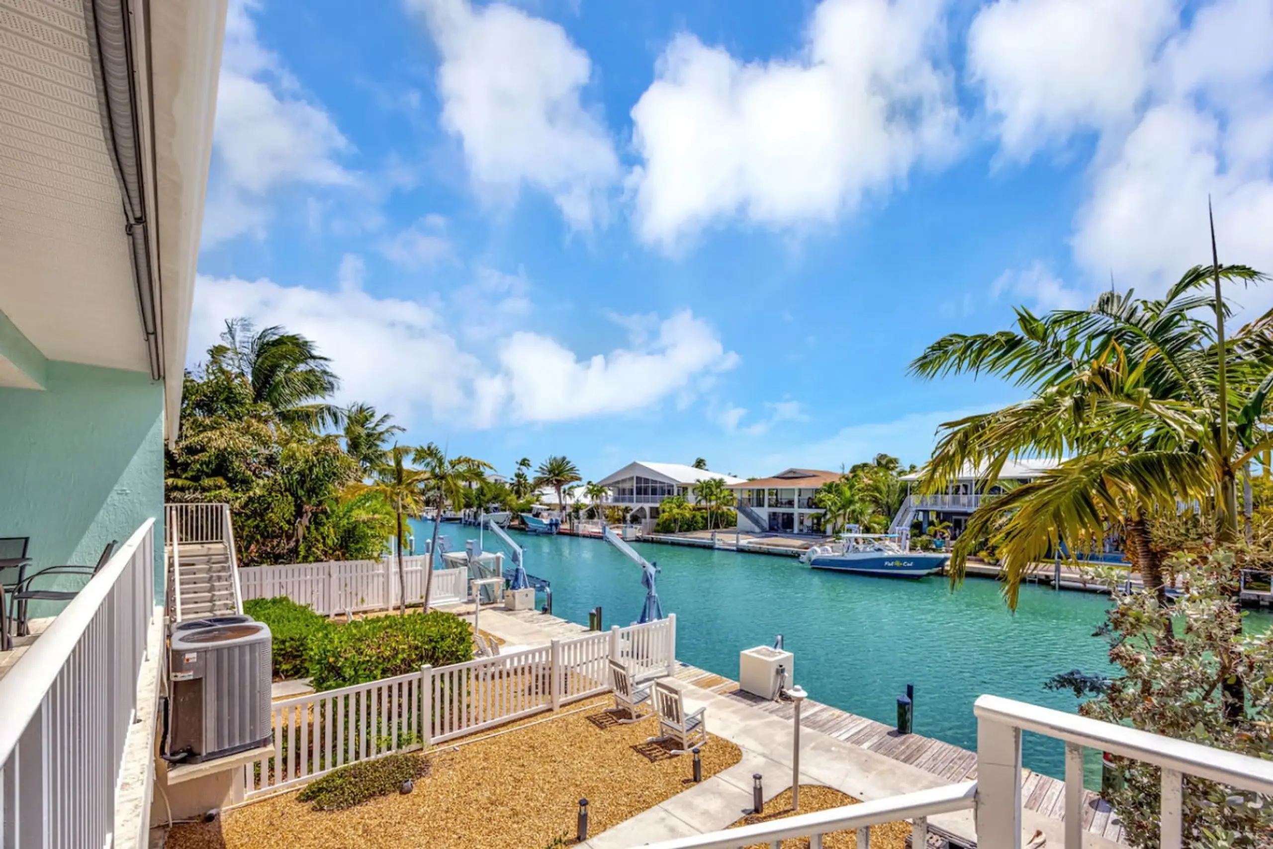 Guest bedroom inside a tropical vacation rental.